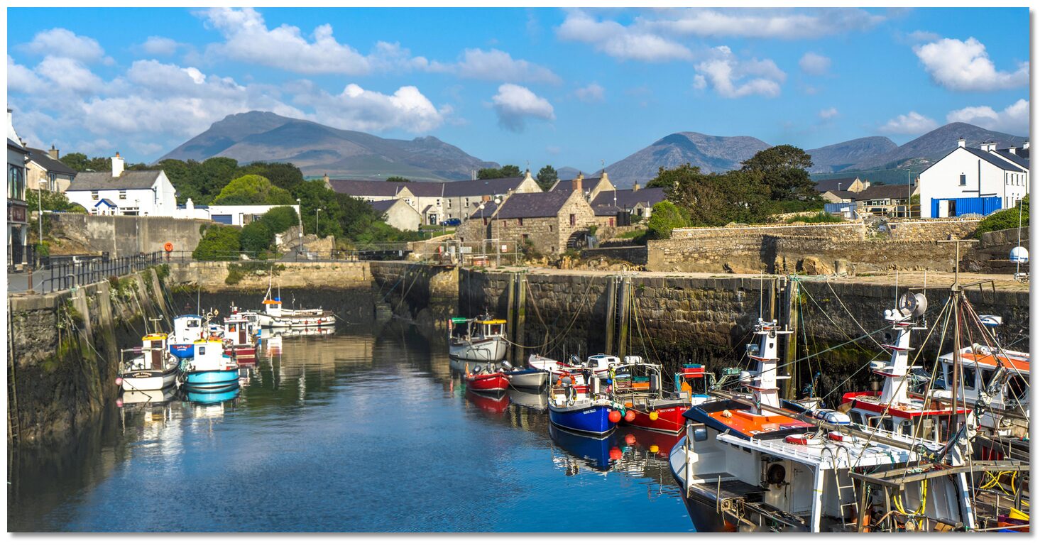 Annalong Harbour with fishing boats and mountains